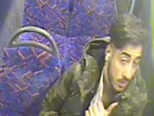Detectives investigating the spitting incident have released this image of a man they want to speak with