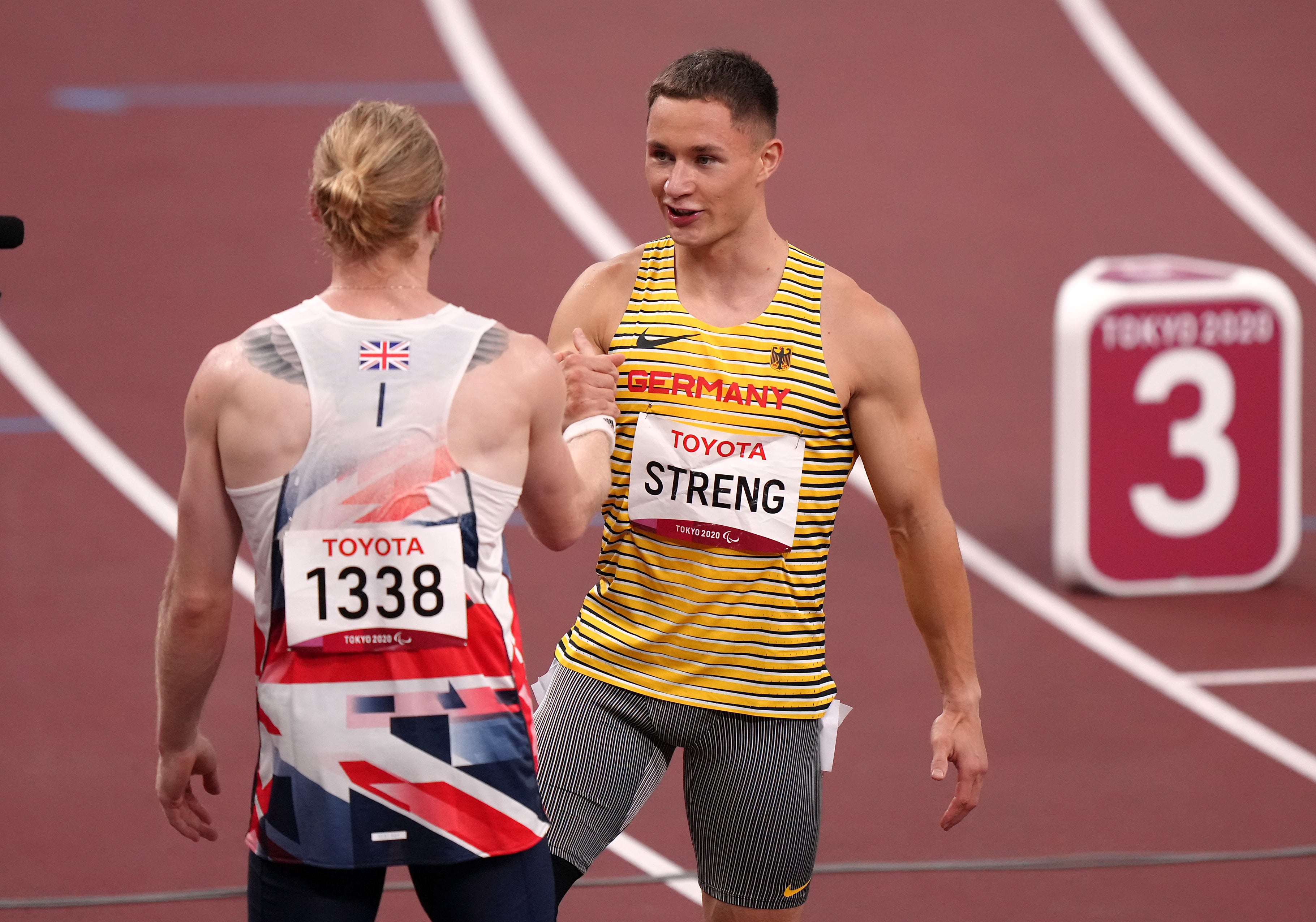Germany’s Felix Streng, right, grabbed 100m gold, with Jonnie Peacock taking joint bronze (Tim Goode/PA)