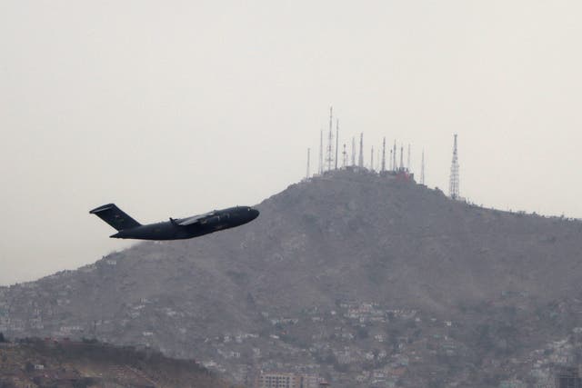<p>File: A military aircraft takes off at the Hamid Karzai International Airport in Kabul, Afghanistan</p>