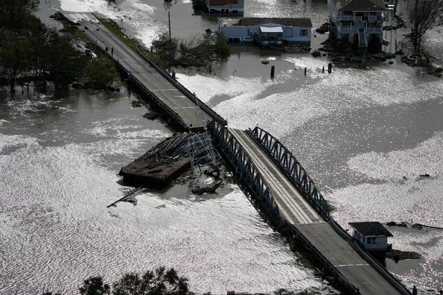 <p>A barge damages a bridge that divides Lafitte, Louisiana and Jean Lafitte, in the aftermath of Hurricane Ida</p>