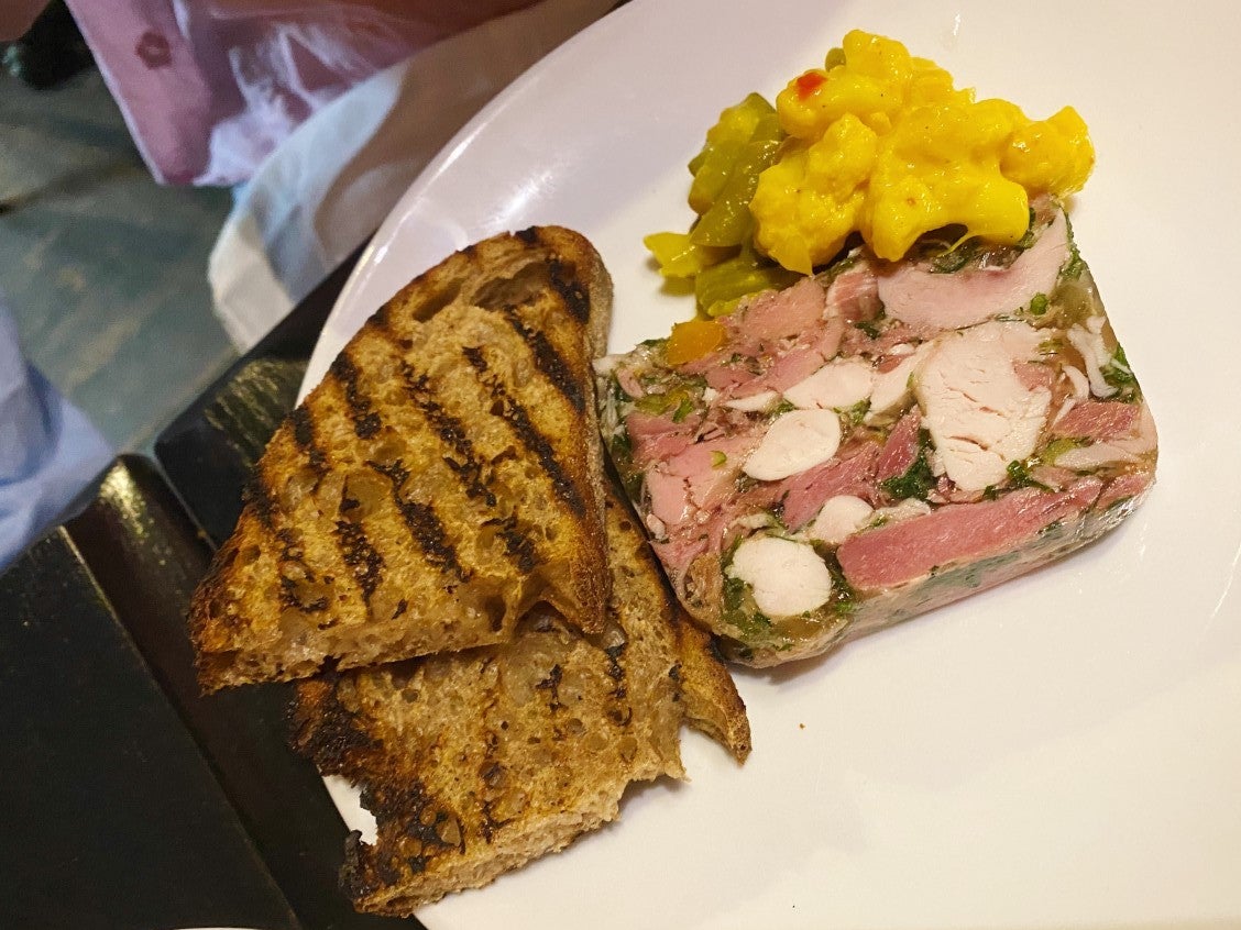 Ham hock and chicken terrine, paired with a briny piccalilli