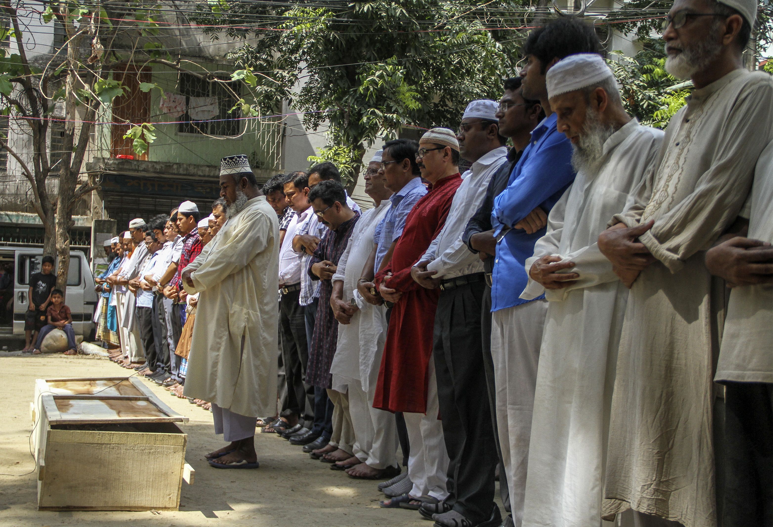 Relatives and friends at the funeral prayer of Bangladeshi activist Xulhaz Mannan in Dhaka in 2016