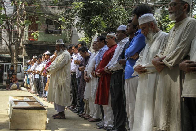 <p>Relatives and friends at the funeral prayer of Bangladeshi activist Xulhaz Mannan in Dhaka in 2016</p>