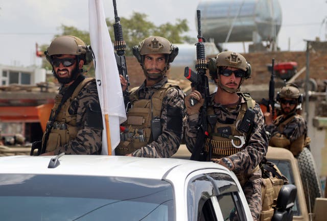 <p>Taliban special force fighters arrive inside the Hamid Karzai International Airport after the US military’s withdrawal</p>