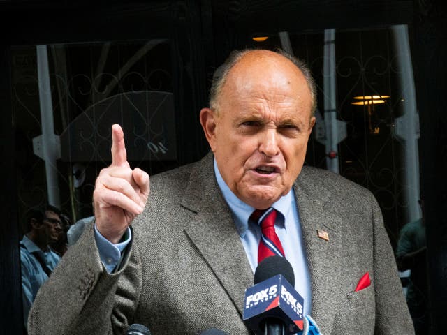 <p>Former New York City Mayor Rudy Giuliani speaks to media about the U.S. evacuation of Afghanistan outside his apartment building in New York City, U.S., August 20, 2021</p>