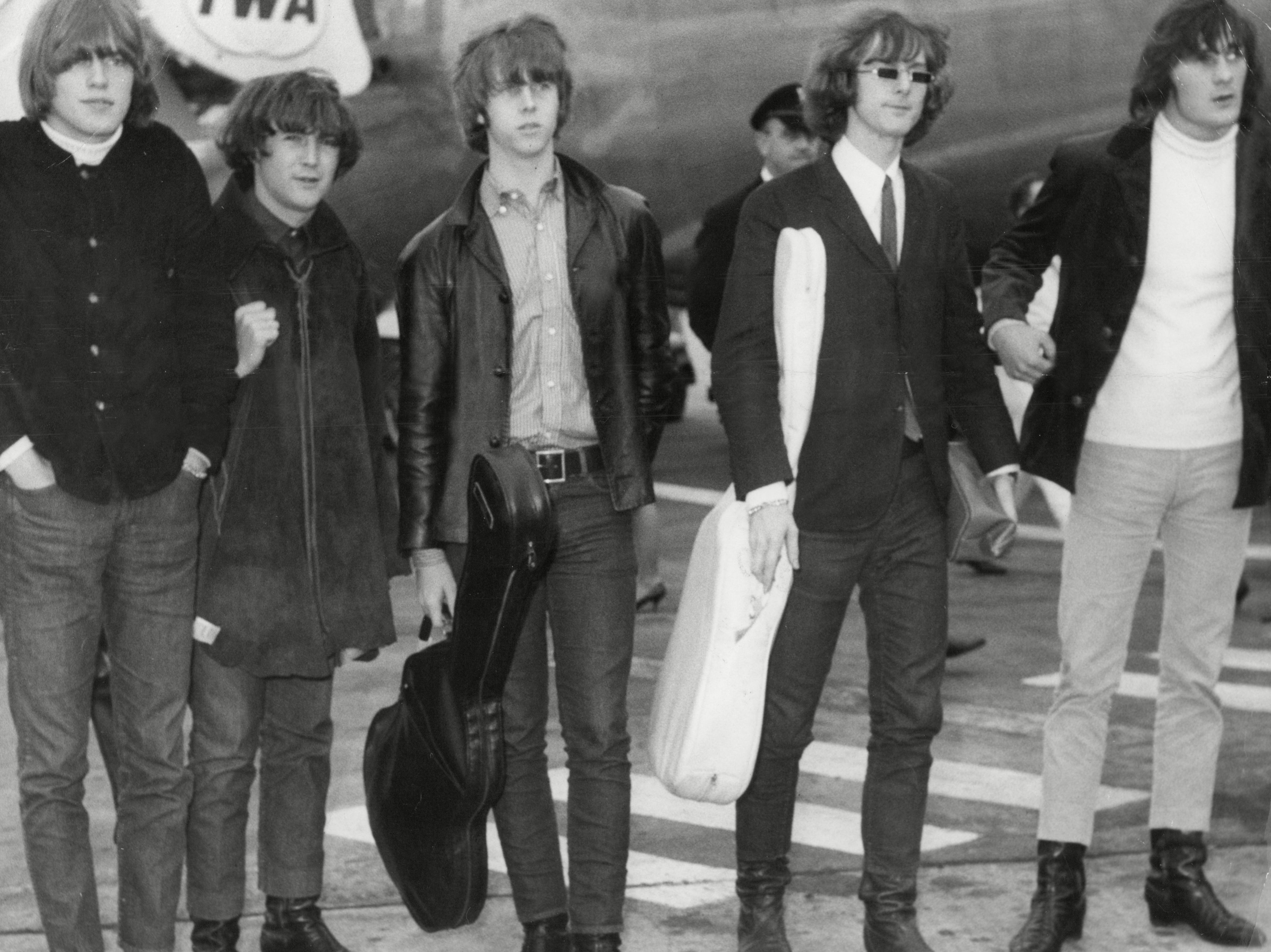 L-R: Mike Clarke, Chris Hillman, David Crosby, Jim McGuinn and Gene Clark of The Byrds at London Airport, 1965