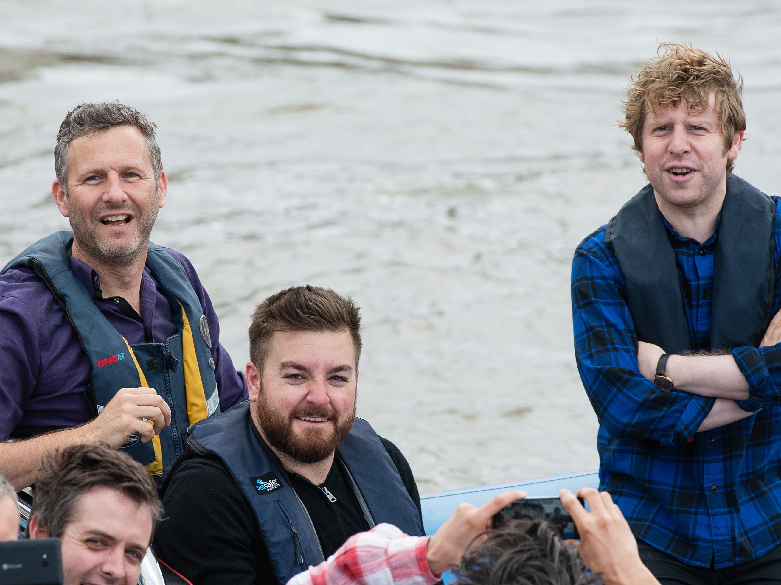 Brooker (centre) and ‘Last Leg’ co-hosts Adam Hills and Josh Widdicombe pursuing Nigel Farage for an interview in a boat on the River Thames in June 2016
