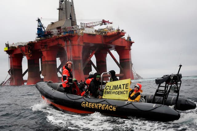 <p>Greenpeace boat alongside BP-chartered oil rig en route to the Vorlich field in the North Sea</p>