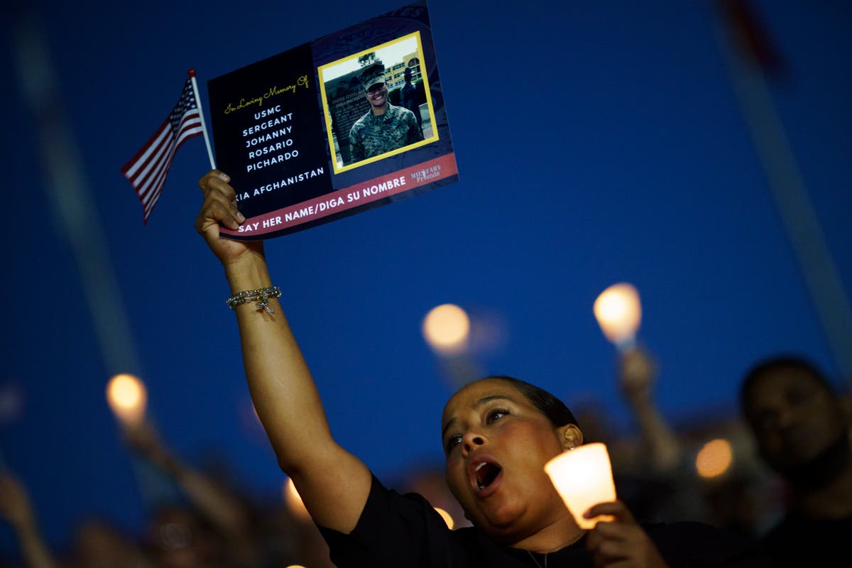 Vigil held for slain US Marine in her home city