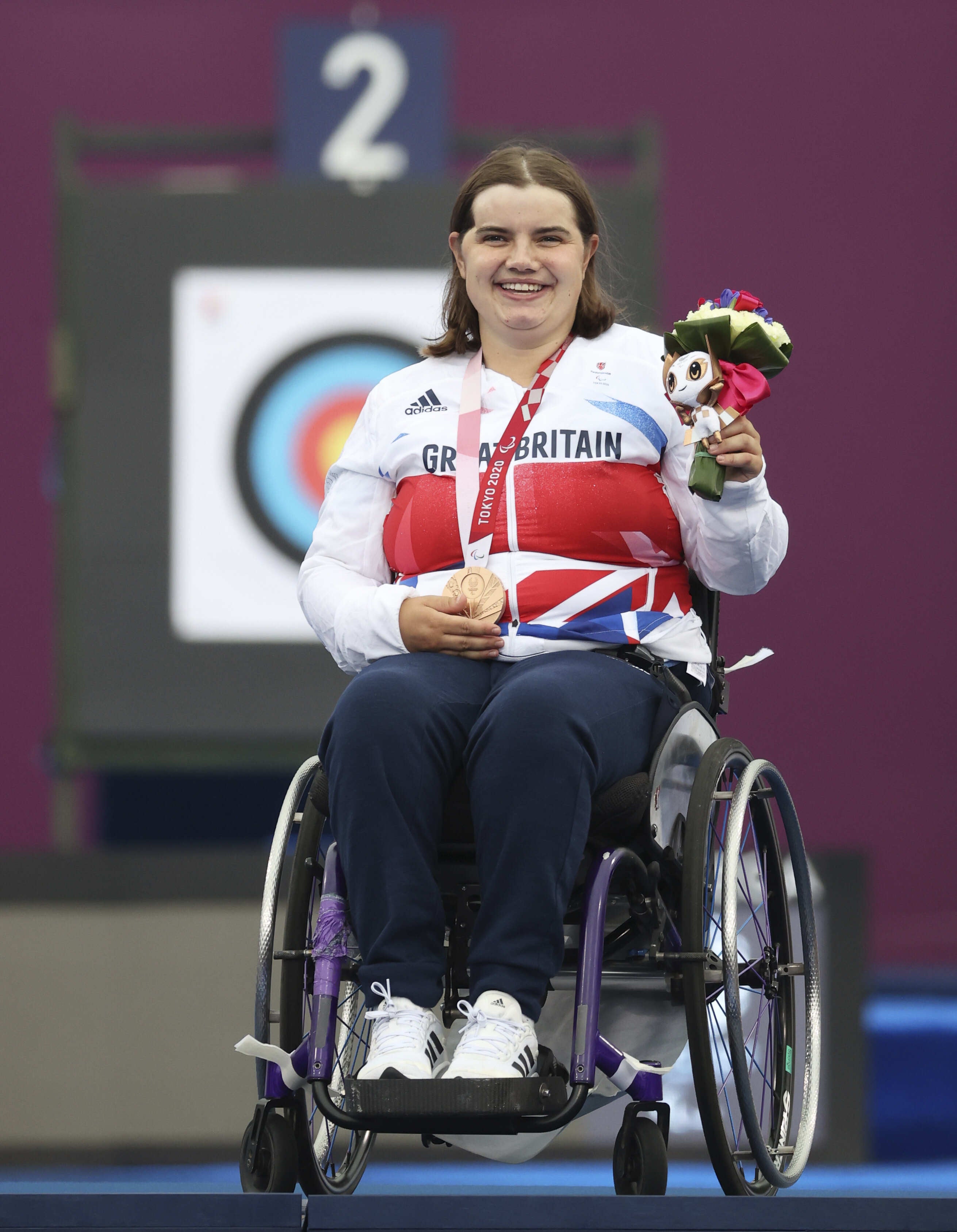 Great Britain’s Victoria Rumary on the podium with her archery bronze medal (ParalympicsGB/imagecomms/PA)