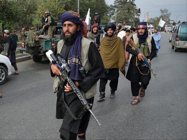 <p>Taliban fighters in Kabul after US and UK forces withdrew on 31 August</p>