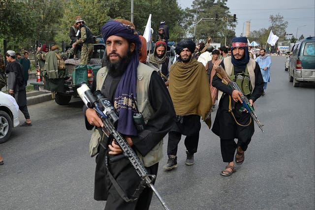 <p>Taliban fighters in Kabul after US and UK forces withdrew on 31 August</p>