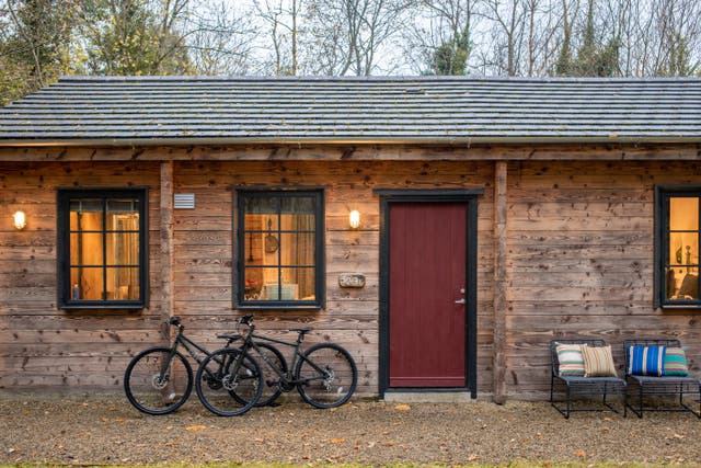 <p>Wooden cabins at Cabu by the Lakes, Ireland</p>