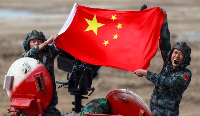 <p>Beijing is stepping up its military development pace</p>