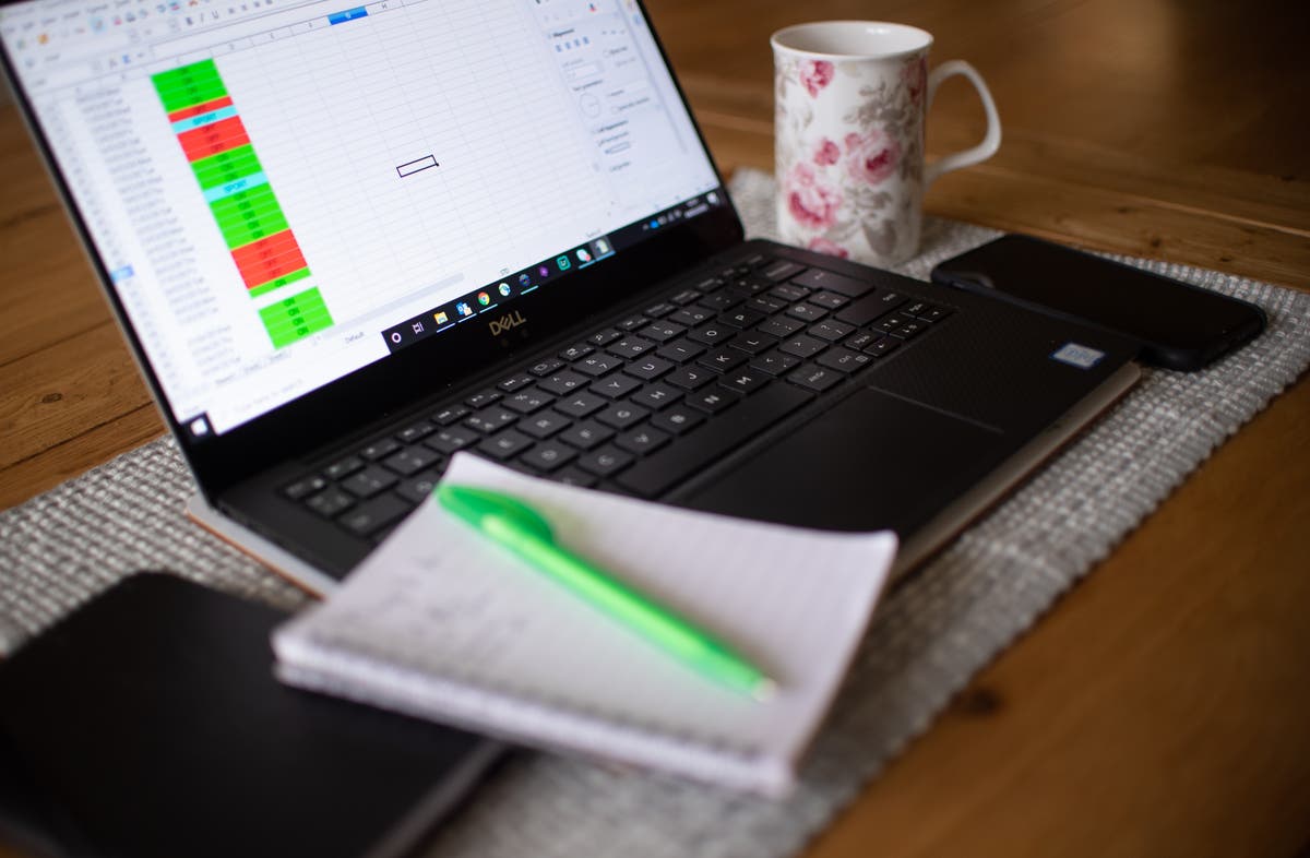 Quarter of office workers would take pay cut for permanent homeworking – survey