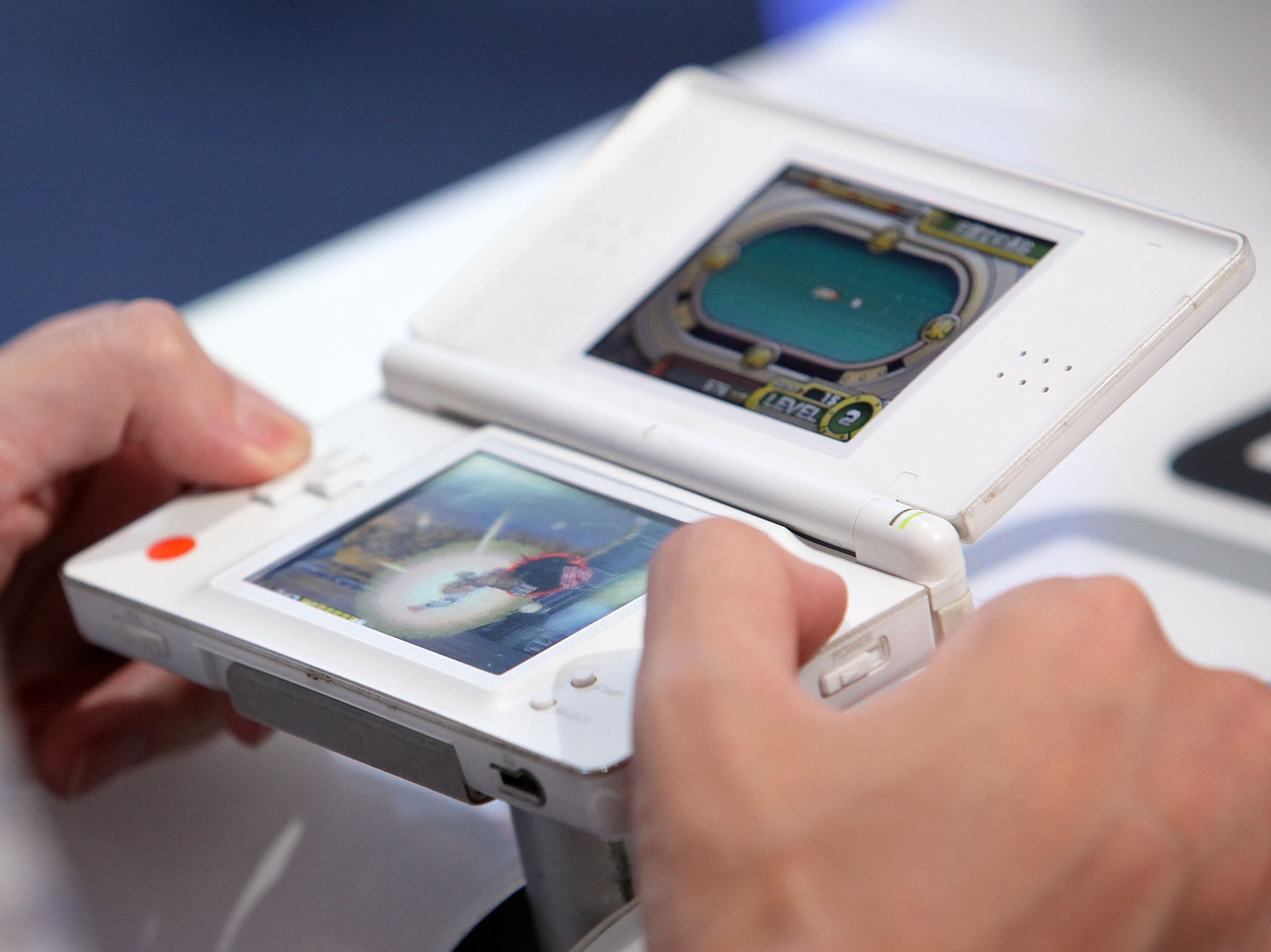 <p>ANintendo DS is played at the 2010 Tokyo Game Show</p>