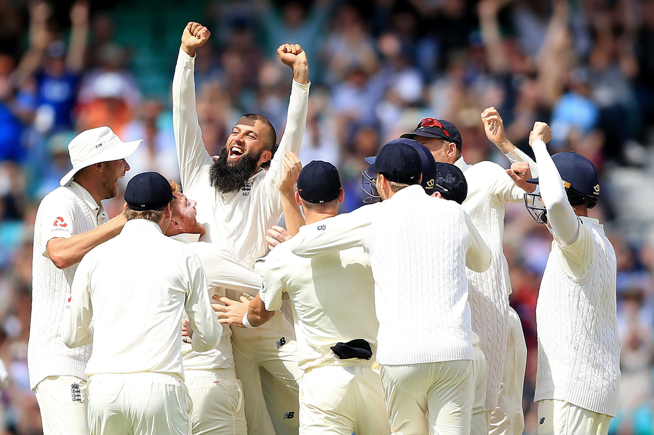 Moeen celebrating his 2017 hat-trick at The Oval (Nigel French/PA)