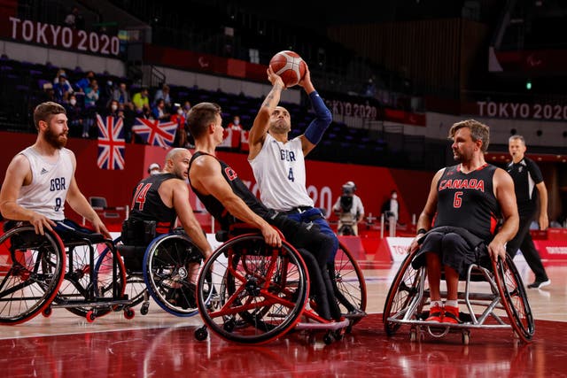 <p>Player-coach Gaz Choudhry shoots in the quarter-final win over Canada </p>