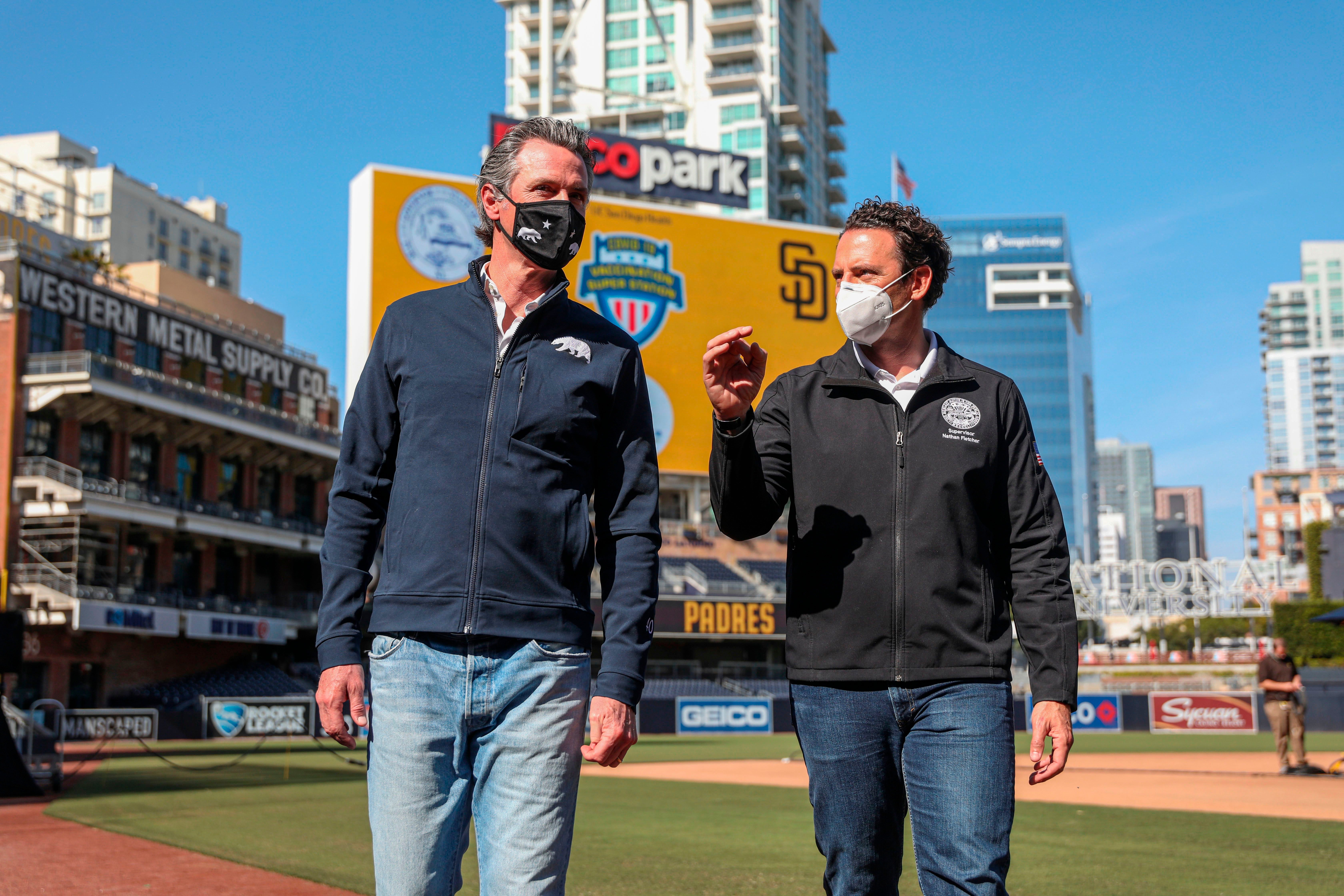 <p>Nathan Fletcher, who led the motion to make San Diego County the first area in the US to declared covid misinformation a public health crisis, talking to California governor Gavin Newsom. </p>
