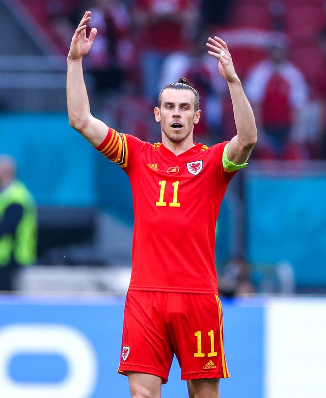 Gareth Bale was seen holding his ankle after being kicked at the end of Wales’ 0-0 draw with Finland in Helsinki (PA)