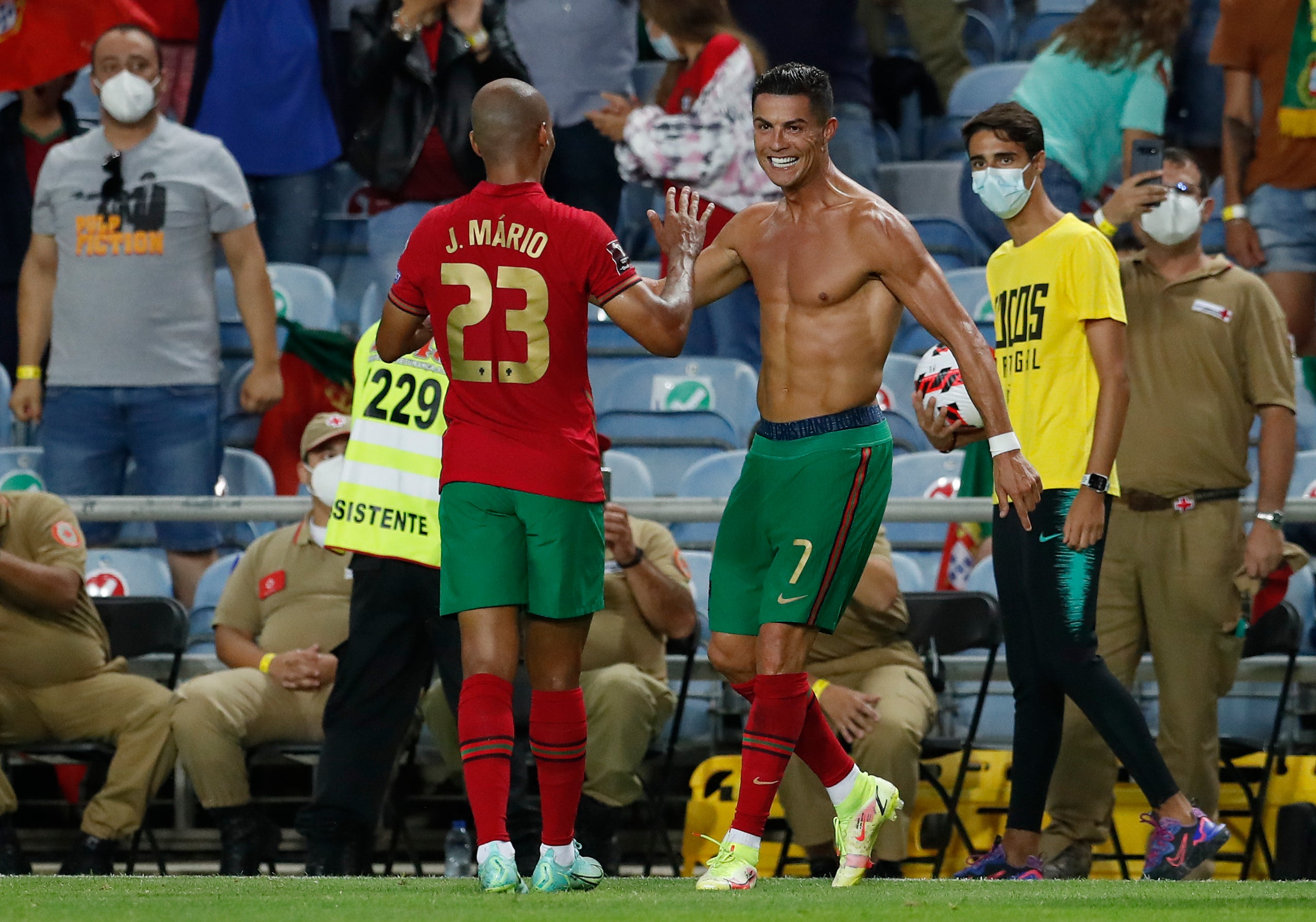 Portugal’s Cristiano Ronaldo, right, celebrates (Armando Franca/AP)