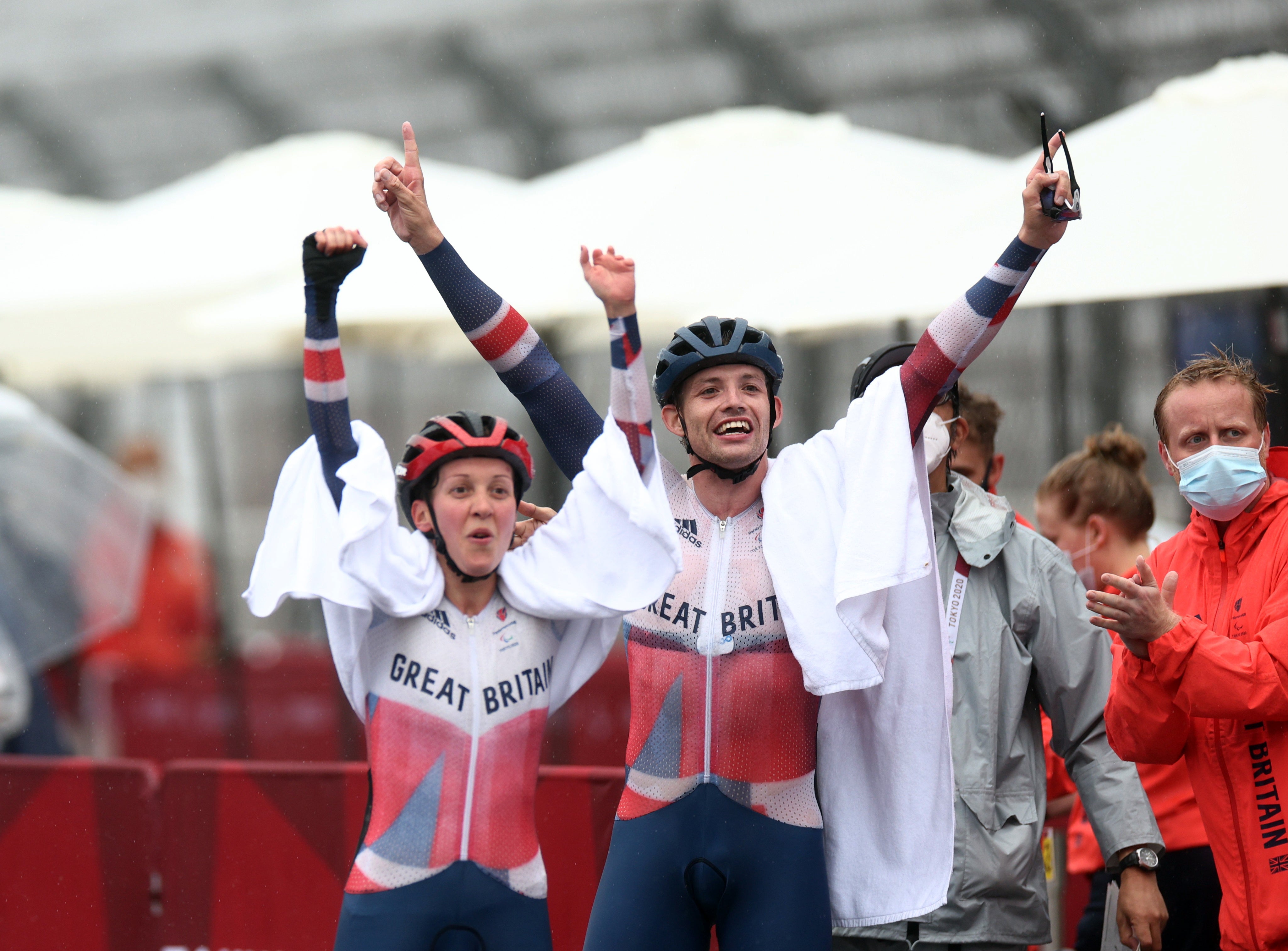 Crystal Lane-Wright celebrates with men’s C4-5 road race winner Benjamin Watson