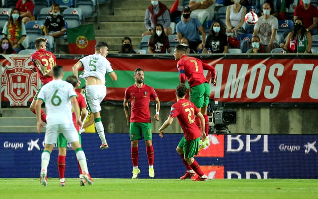 John Egan, wearing number five, is convinced there is more to come from the Republic of Ireland after Cristiano Ronaldo’s enduring brilliance condemned them to a heart-breaking World Cup qualifier defeat (Isabel Infantes/PA)