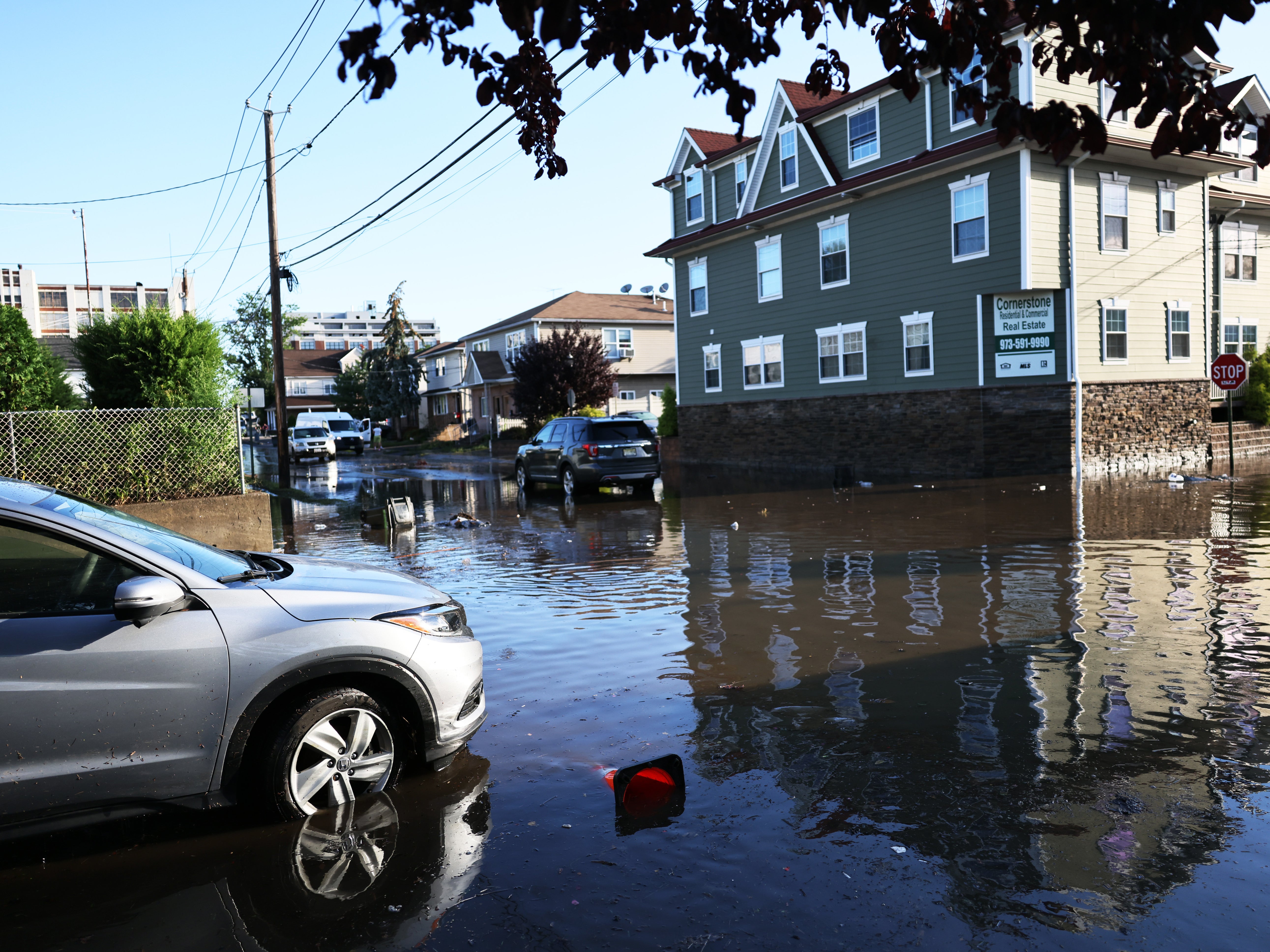 A stranded car in flood water is seen on Lester Street on September 02, 2021 in Passaic City