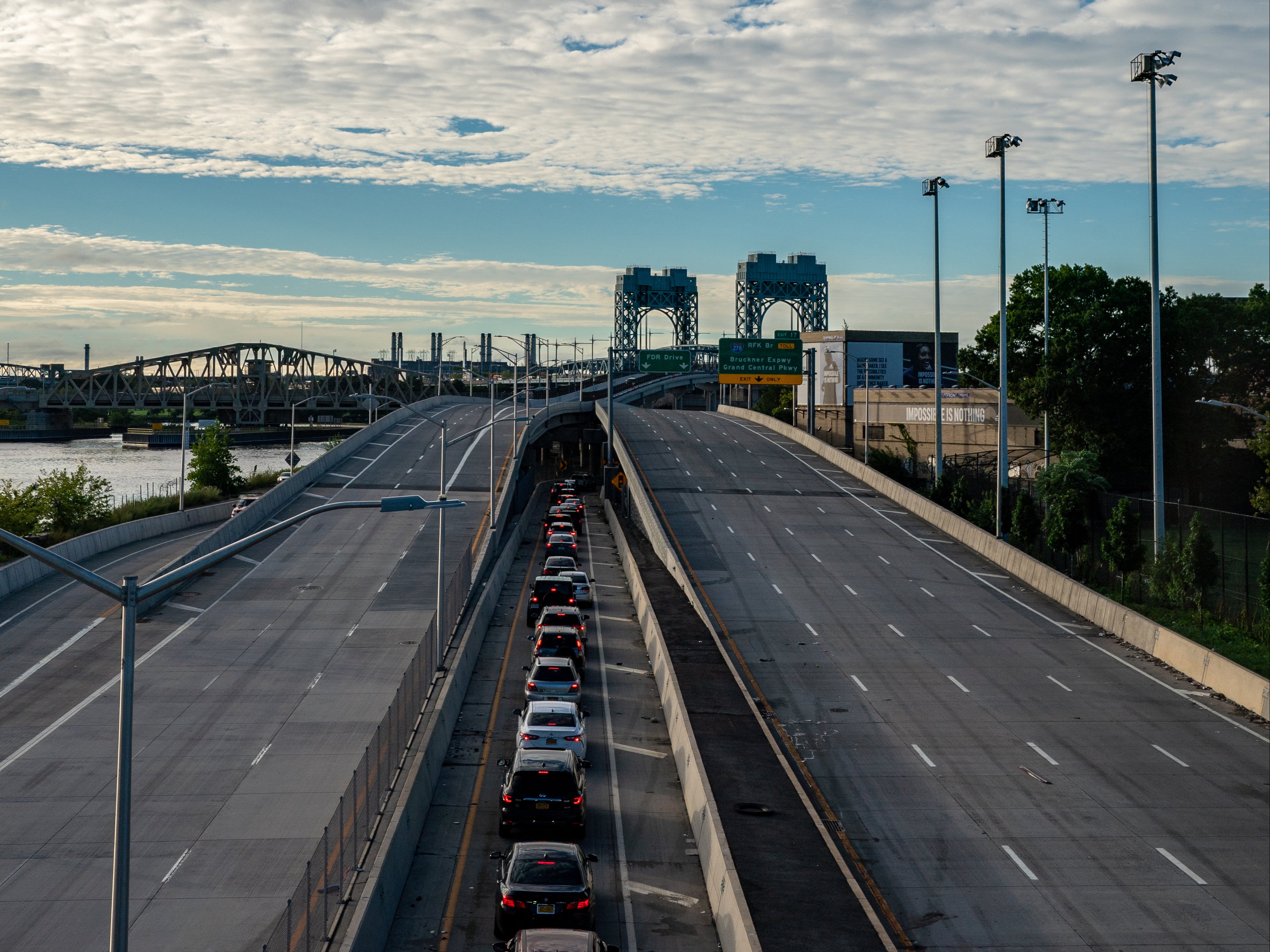 Drivers exit the F.D.R. Drive on 125th st as the thoroughfare was closed down to 59th street after extremely heavy rainfall from the remnants of Hurricane Ida on September 2, 2021