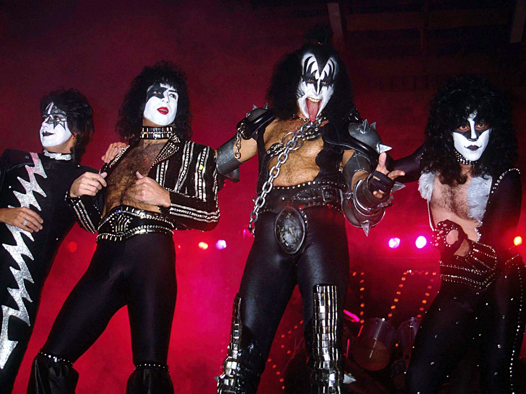 Simmons (second from right) with Kiss on stage in 1982
