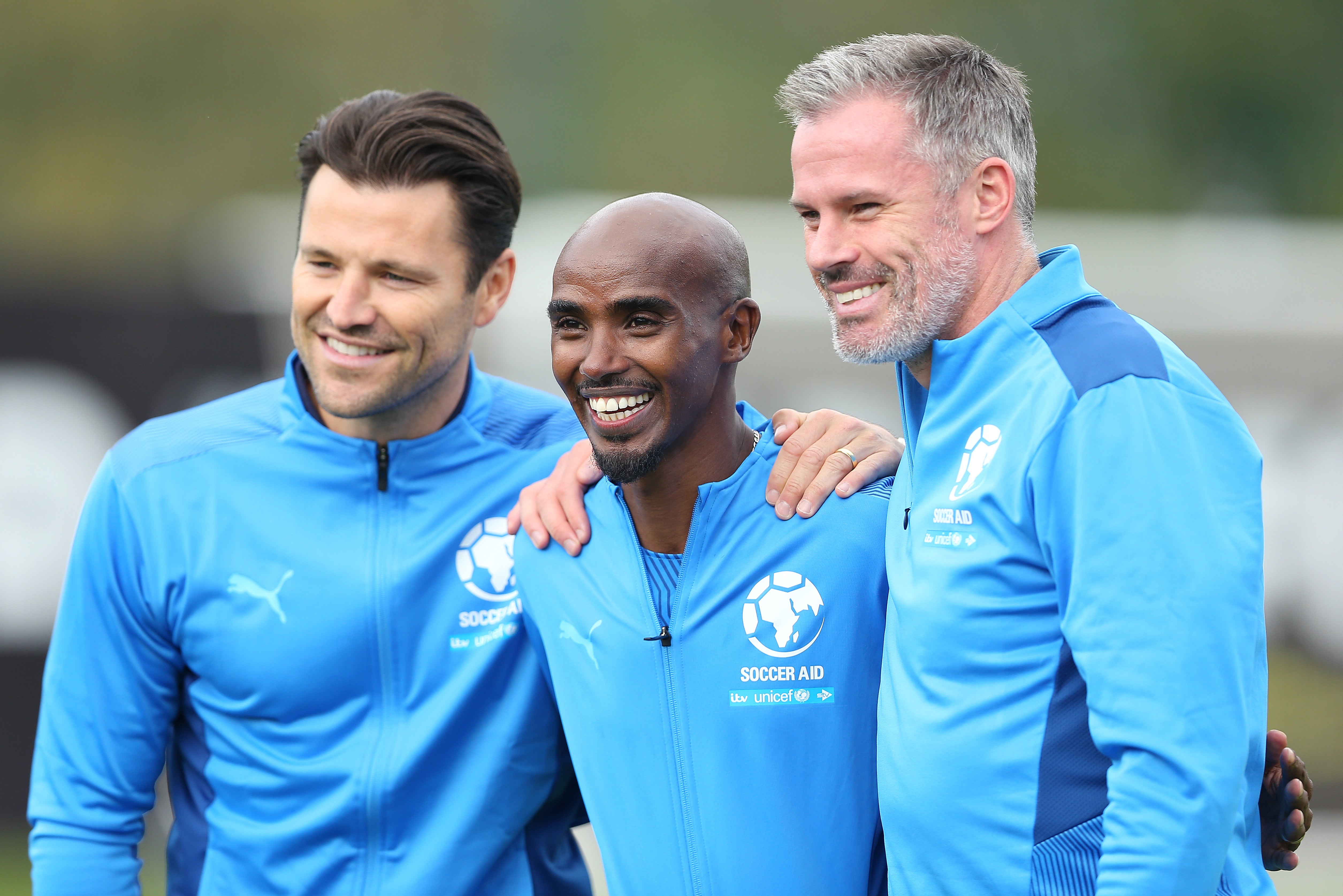 Mark Wright, Sir Mo Farah and Jamie Carragher of England pose for a photograph prior to Soccer Aid