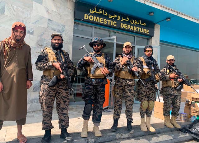 <p>Taliban fighters stand guard inside the Hamid Karzai International Airport after the US withdrawal in Kabul, Afghanistan on 31 August 2021 </p>