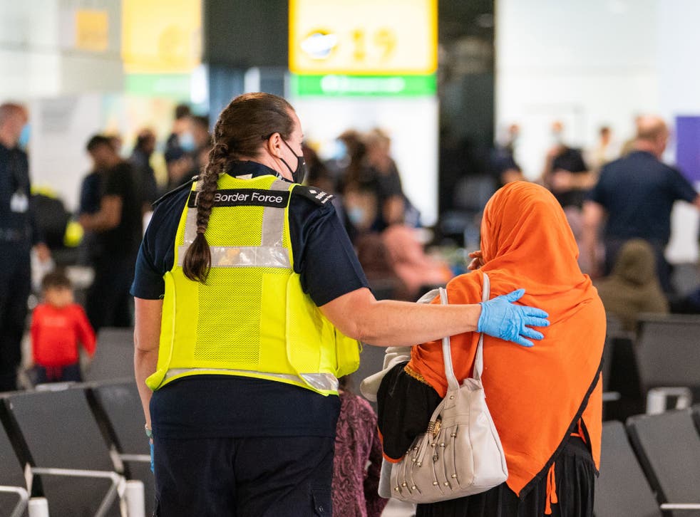 <p>Refugees from Afghanistan arrive at Heathrow airport. A place of safety may be the first priority, but what happens next is often neglected </p>
