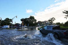 Man, 70, swept to his death in Ida flash flood as family pulled from vehicle by firefighters in scuba gear