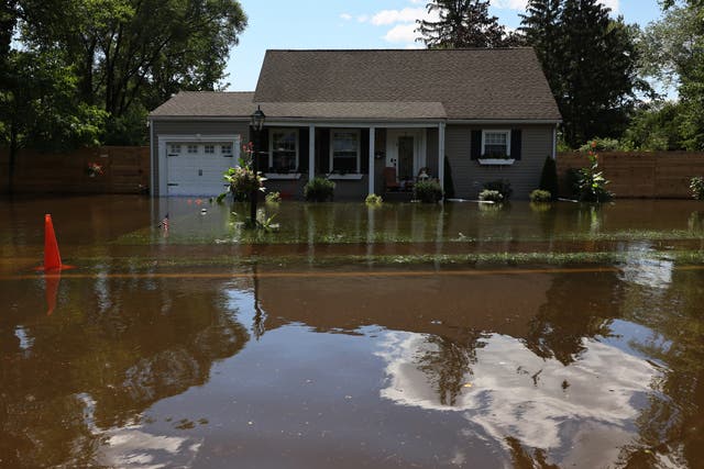 <p>River water floods the front of a home on West Williams Street Road on September 02, 2021 in Lincoln Park, New Jersey</p>