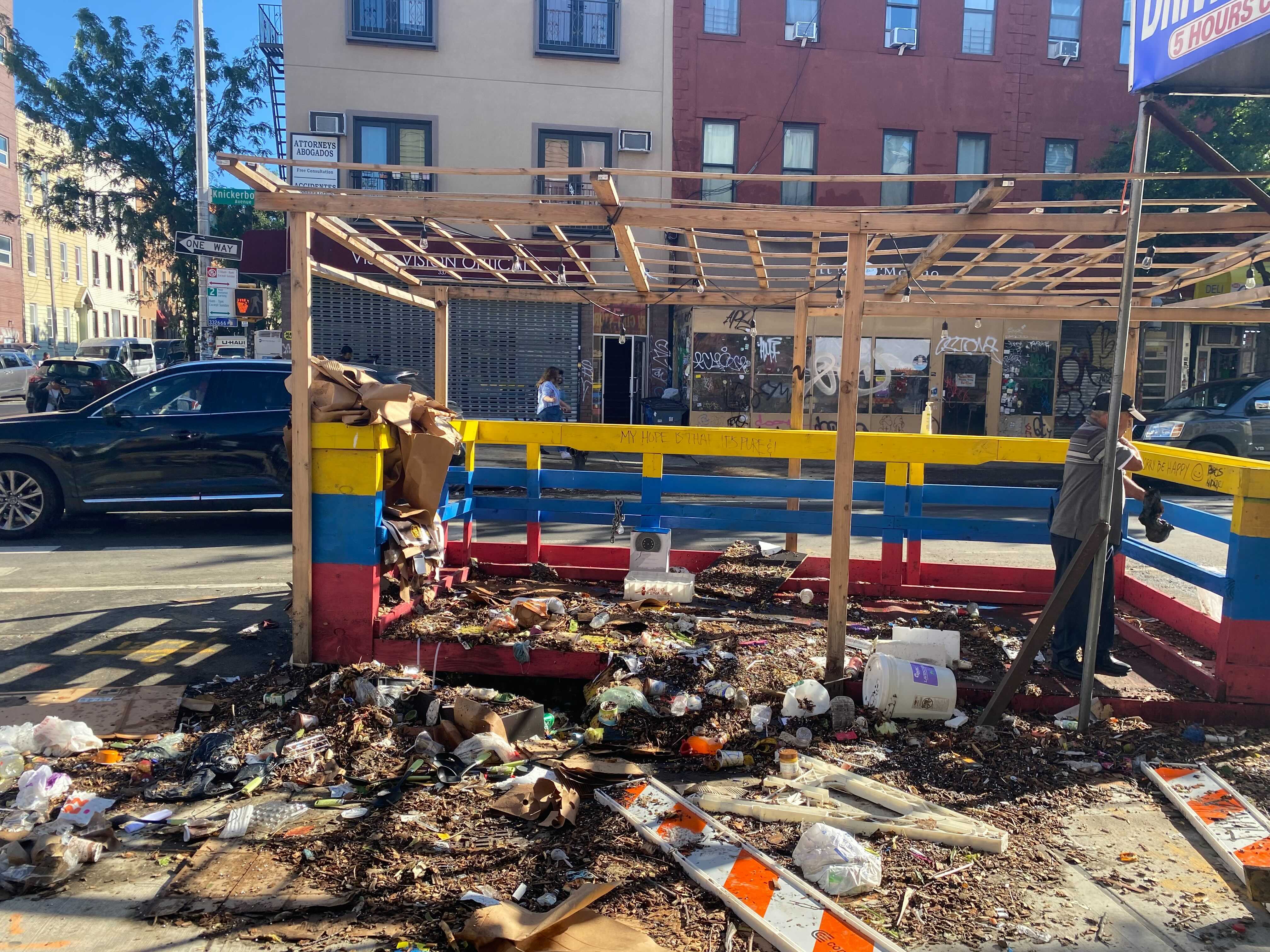 An outdoor dining area at Ecuadorian eatery, El Encebollado de Victor, in Brooklyn, New York was overwhelmed with debris following torrential rain and winds from Ida