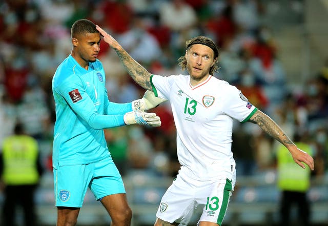 Republic of Ireland midfielder Jeff Hendrick (right) congratulates keeper Gavin Bazunu on his penalty save from Cristiano Ronaldo (Isabel Infantes/PA)