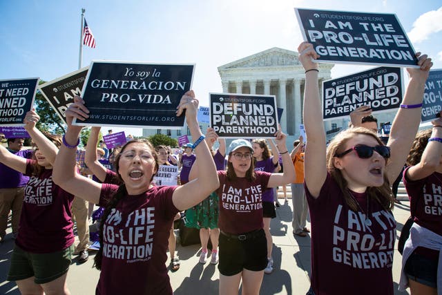 <p>File: Pro-life and anti-abortion advocates demonstrate in front of the Supreme Court in Washington</p>
