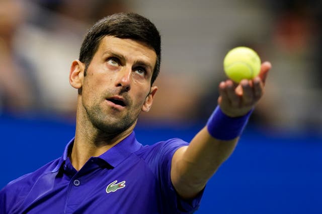 Novak Djokovic overcame an off-court distraction to book his place in the US Open third round (Frank Franklin II/AP)