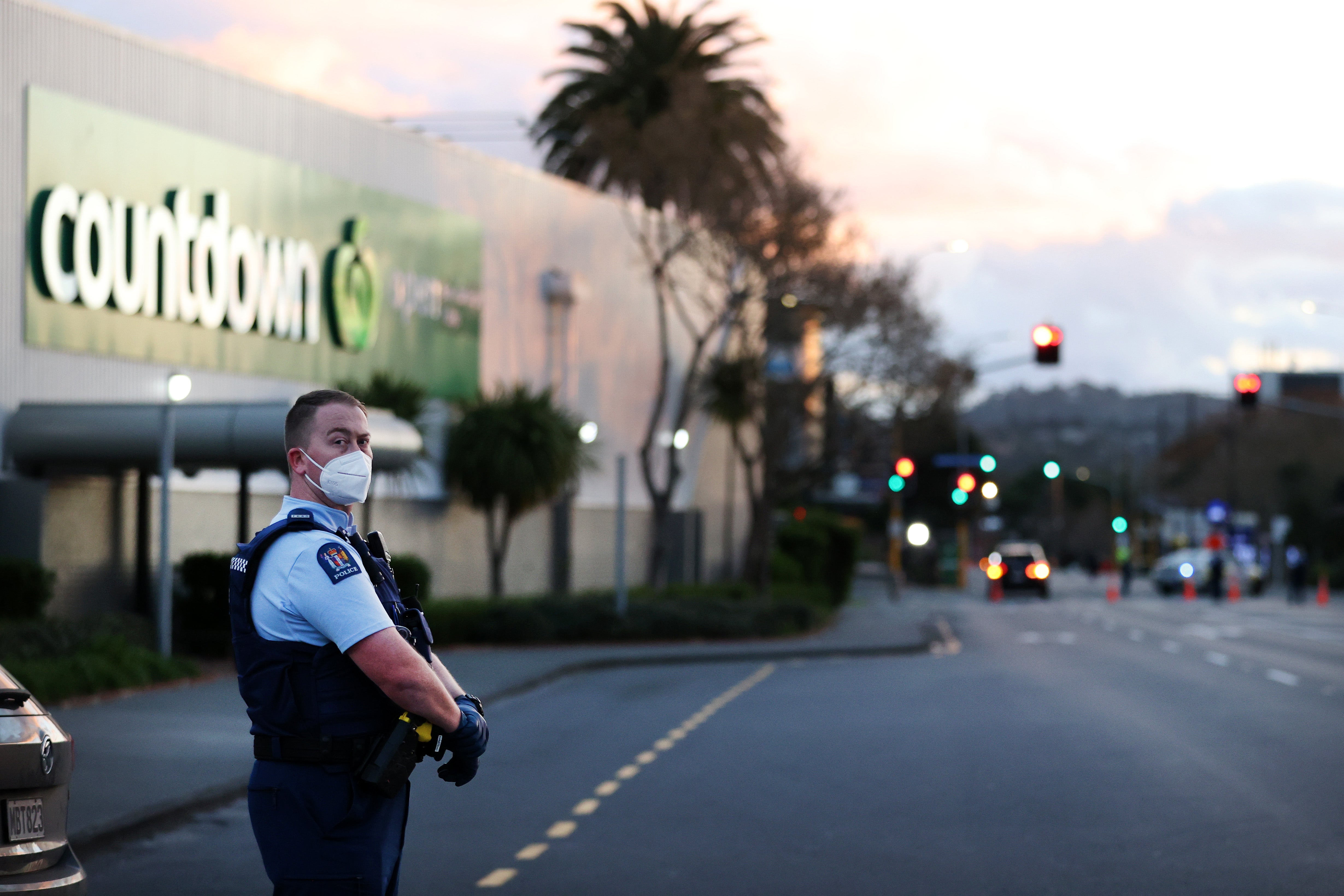 Police guard the area around Countdown mall after a violent extremist took out a terrorist attack stabbing six people before being shot by police on 3 September 2021 in Auckland, New Zealand