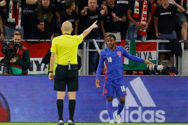 <p>Raheem Sterling speaks to the referee during Thursday’s World Cup qualifier in Budapest </p>