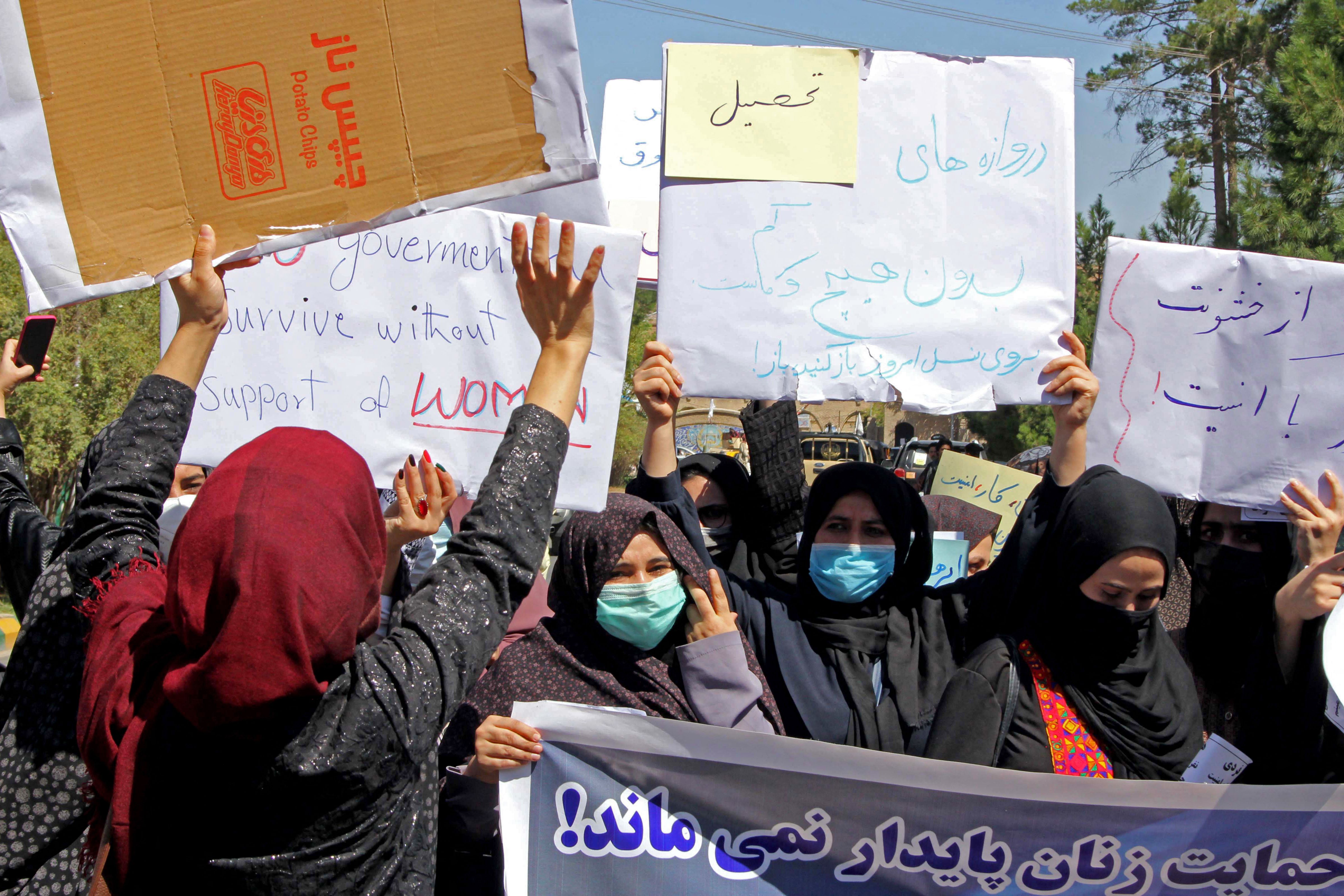 ‘Don’t be afraid, we are together’: Dozens of women chant in protest against the Taliban in Afghanistan