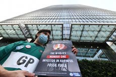 ‘It’s my duty as a doctor’: Extinction Rebellion medics glued to bank demand end of fossil fuel investment