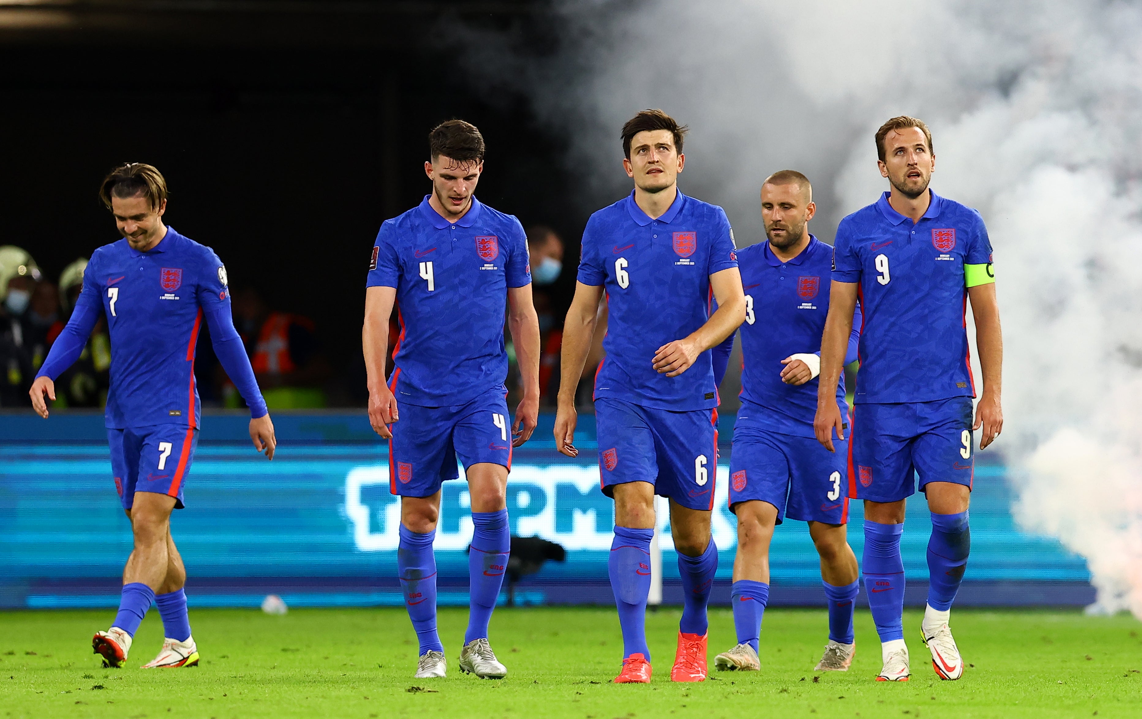 Harry Maguire walks back after scoring for England in Hungary (Attila Trenka/PA)