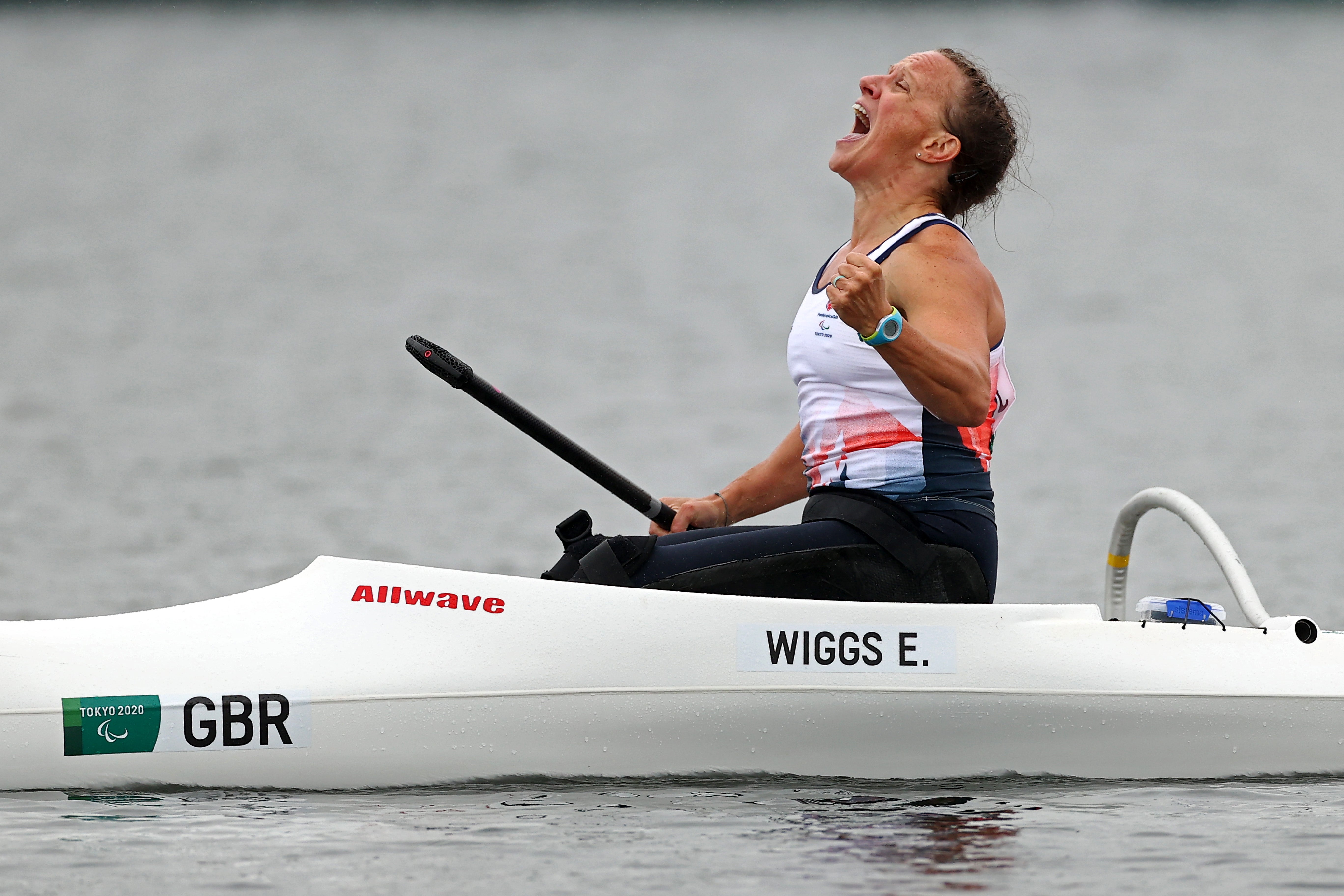 Emma Wiggs celebrates her gold medal