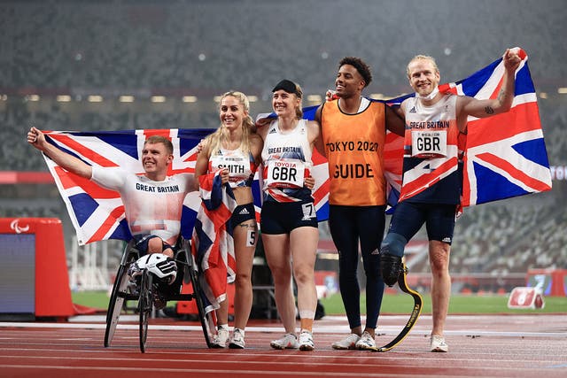 <p>Nathan McGuire, Ali Smith, Libby Clegg, guide Chris Clarke and Jonnie Peacock celebrate</p>