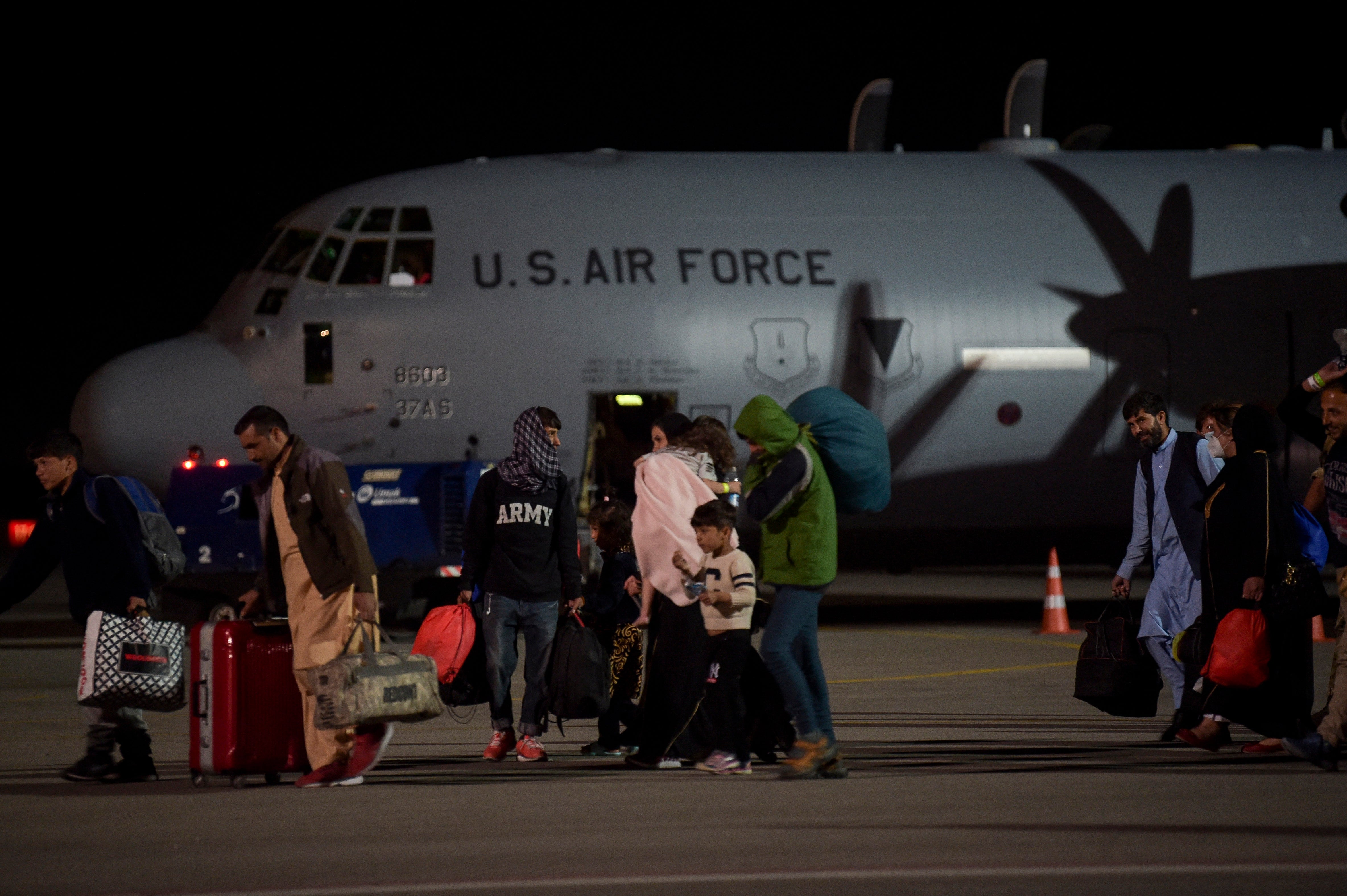 Some refugees boarding planes reportedly do not know where they are heading