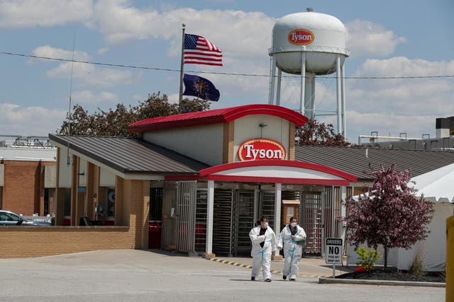 <p>Workers leave the Tyson Foods pork processing plant in Indiana </p>