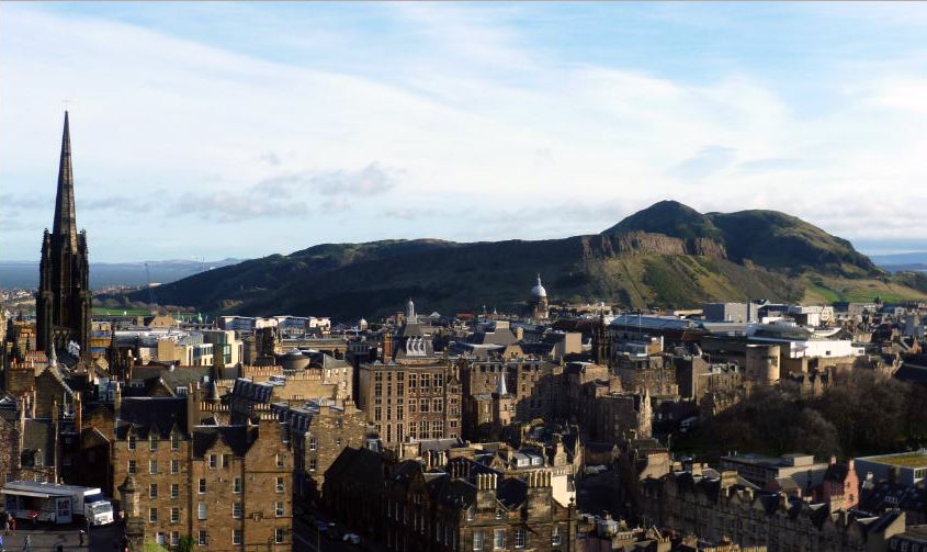 The woman died after falling from the hill that overlooks the city of Edinburgh