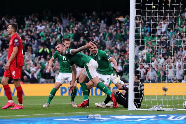 Shane Duffy celebrates scoring Ireland’s equaliser (Niall Carson/PA)